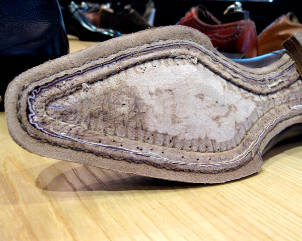 A picture of a handwelted shoe with a leather holdfast