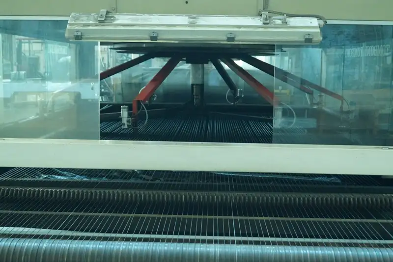 a machine that puts on the dyes