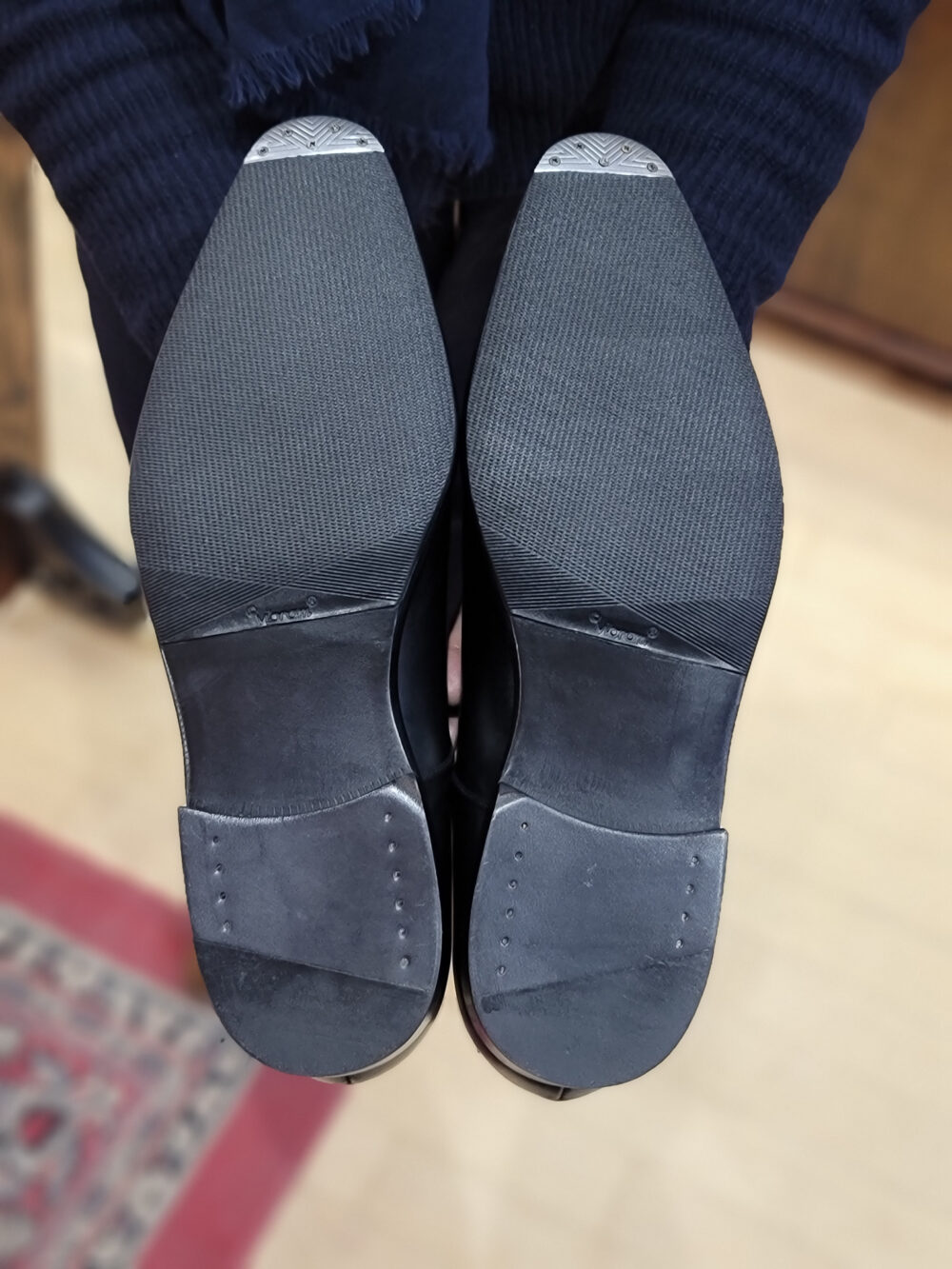 shoe sole bottoms with rubber inset and metal toe taps