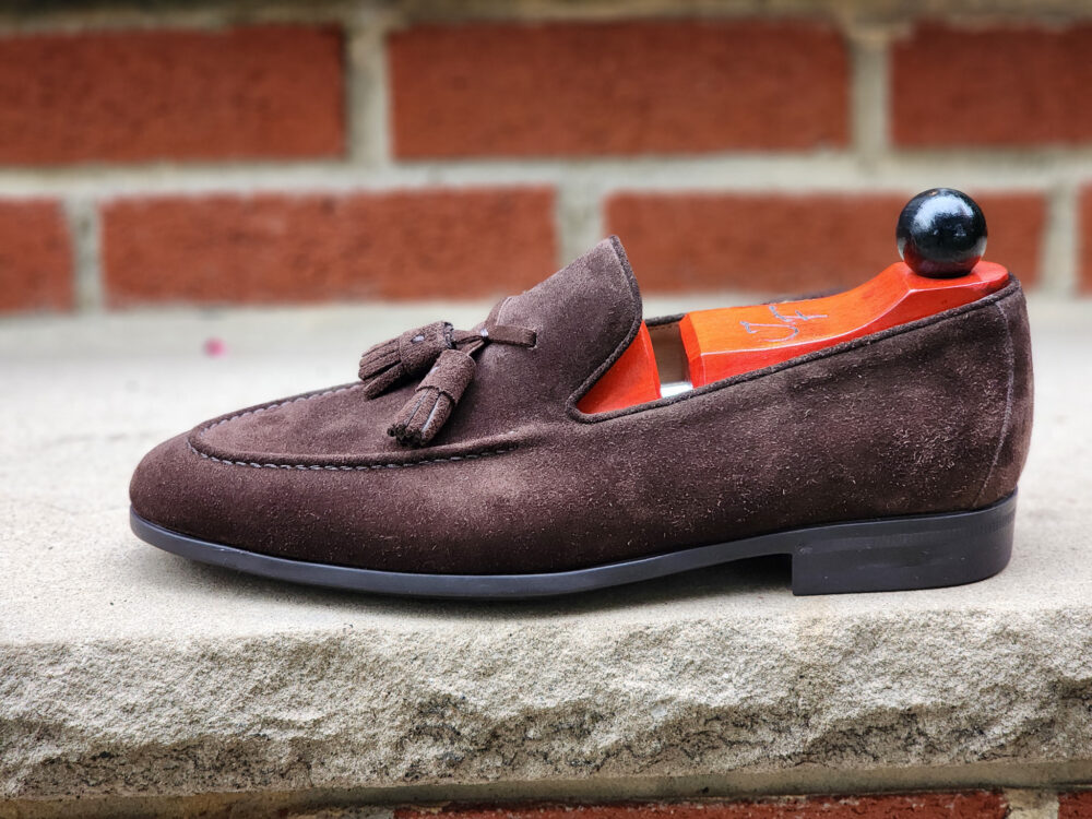 profile of suede tassel loafers