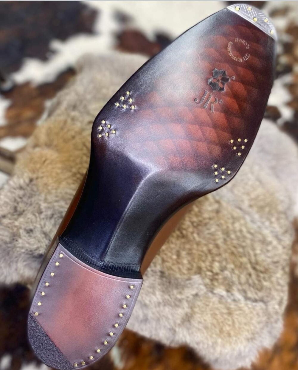 nail and painting sole decoration on leather sole