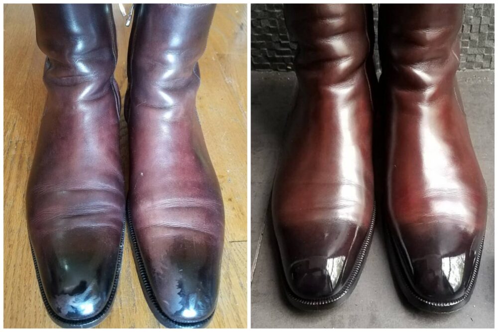 A pair of polished brown leather boots with pointed toes, showing varying levels of shine on the toe caps.