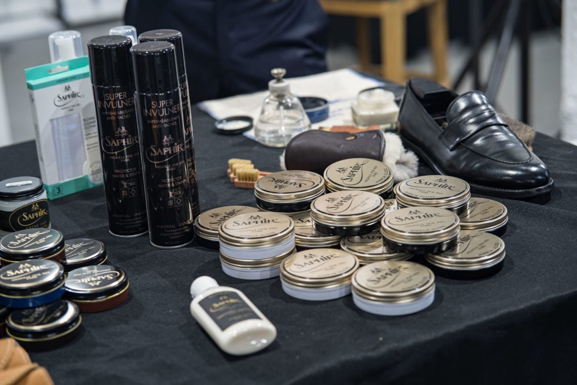 Saphir's table were packed with their shoe care products.