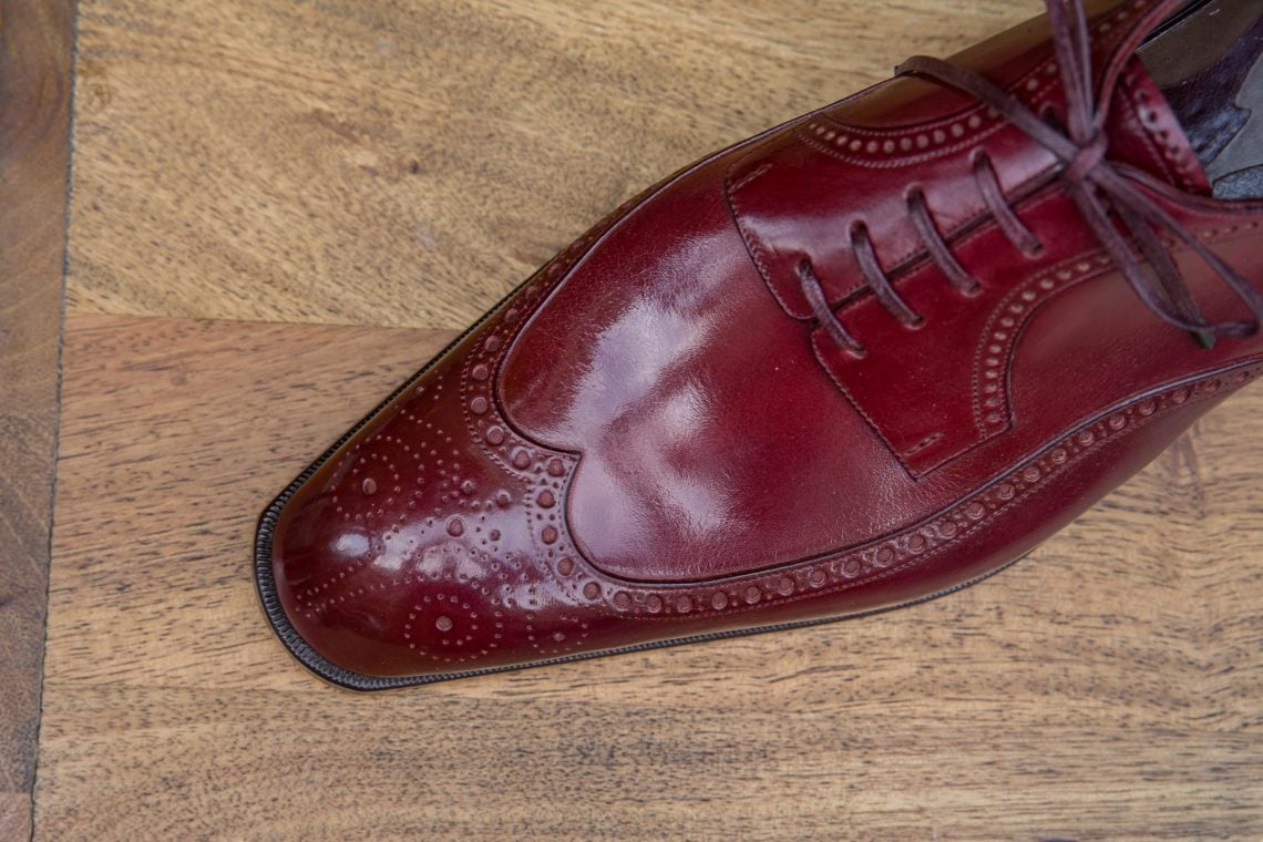 Here if one look close one can see that some extra stress have been put on the leather due to it being lasted as seamless wholecuts over the shoe. But lasting work has been done superbly.