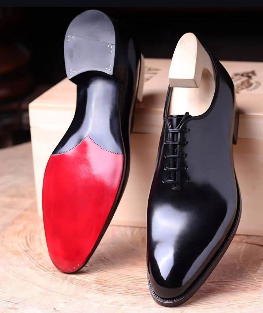 black wholecut dress shoe