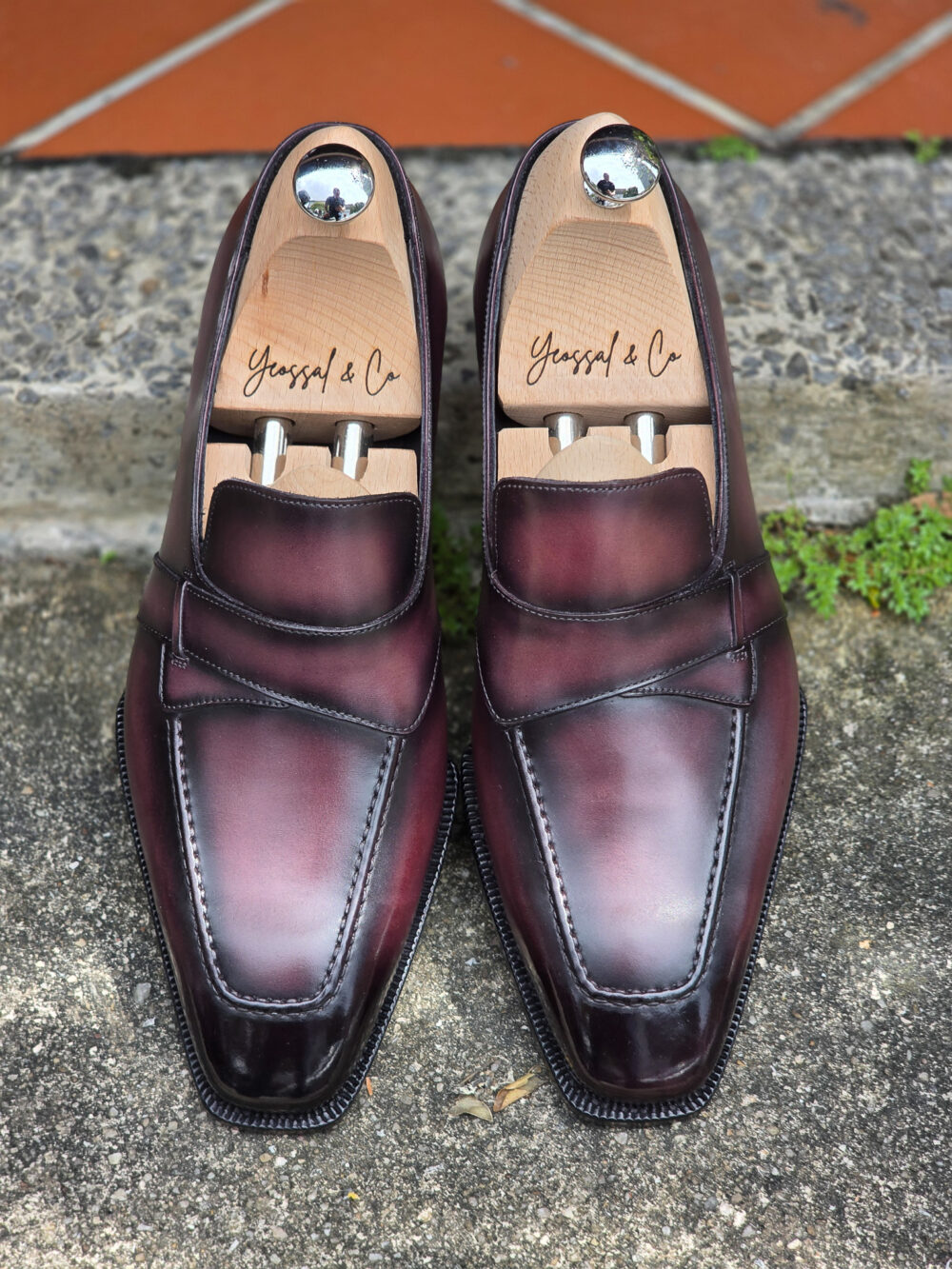 A pair of polished burgundy leather  butterfly Yeossal loafers 