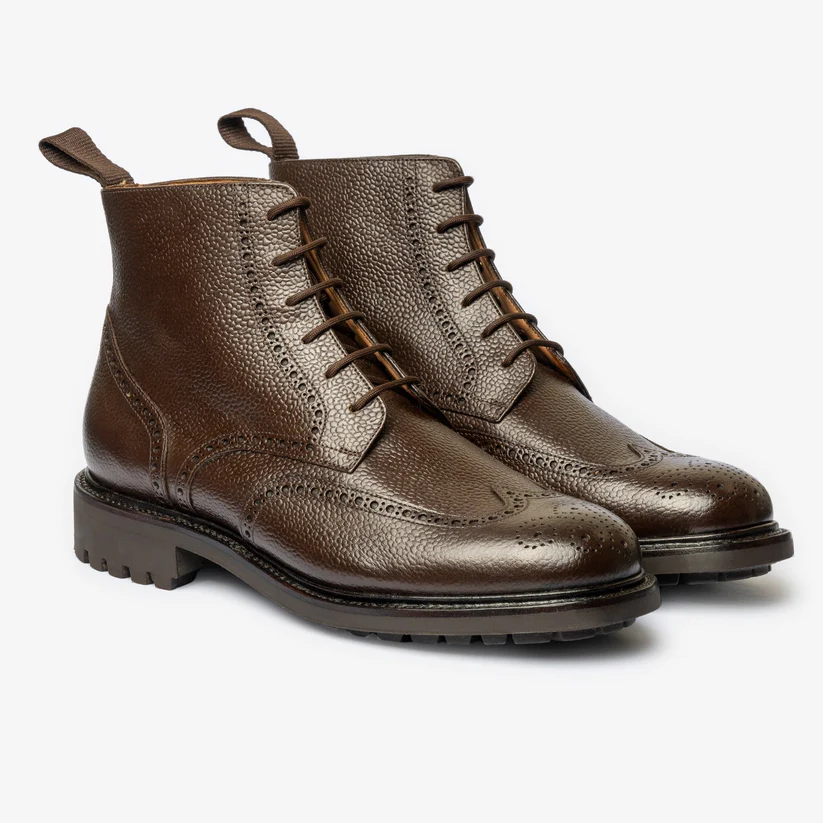 Brown leather lace-up boots with a textured finish and brogue detailing as part of the Bridlen Spring Promotion