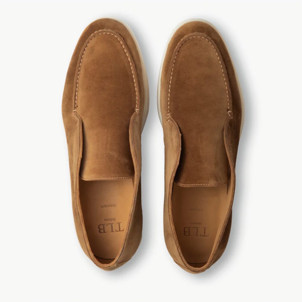 A pair of brown suede TLB Mallorca Laceless Ankle Boots with a smooth finish and stitching details.