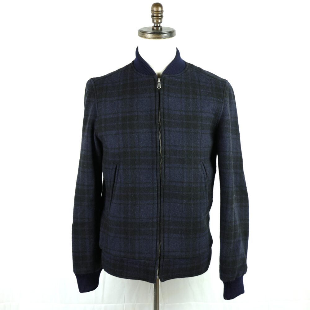 A navy plaid bomber jacket with a zip front and ribbed collar.