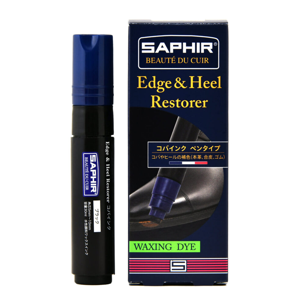 A black and blue Saphir Edge & Heel Restorer marker with a packaging box featuring text in multiple languages.