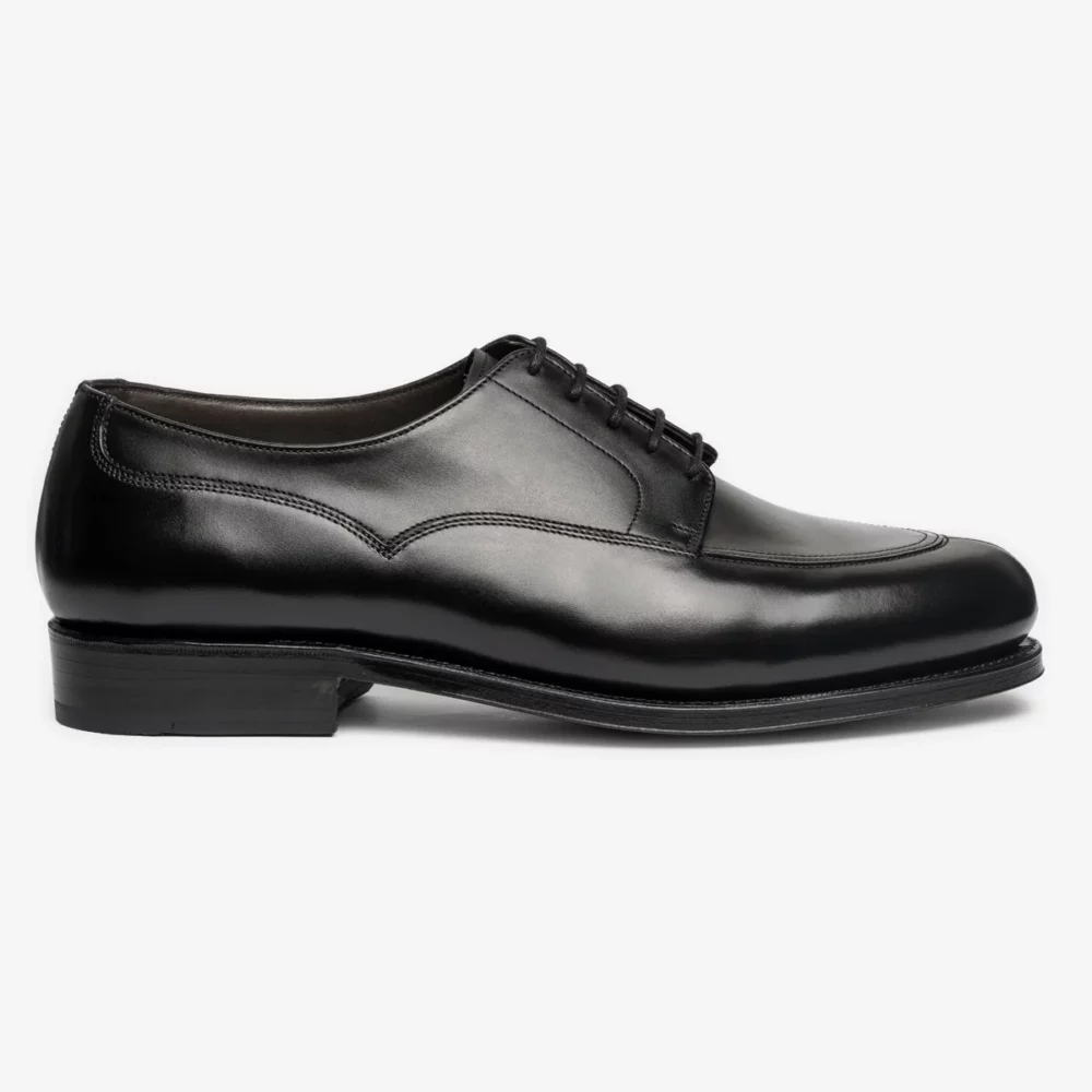 A sleek black leather dress shoe with a rounded toe and lace-up design.