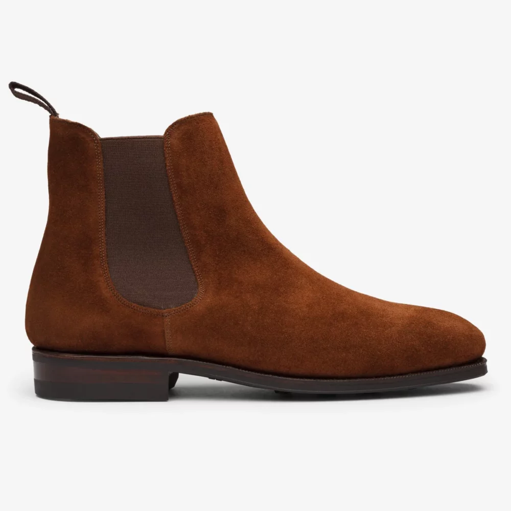 Brown suede Chelsea boot with elastic side panels.