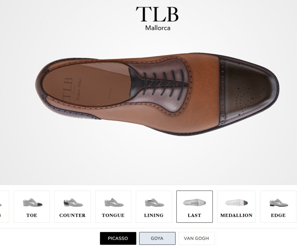 Brown leather dress shoe with a black toe cap and decorative perforations.