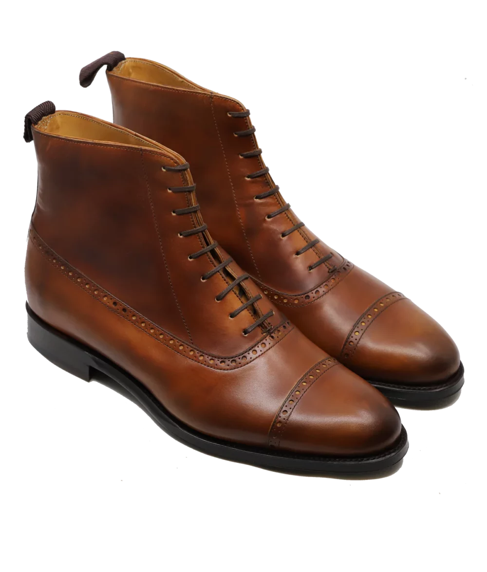 Brown leather ankle boots with a lace-up design, featured in the Septieme Largeur Summer Sale 2026.