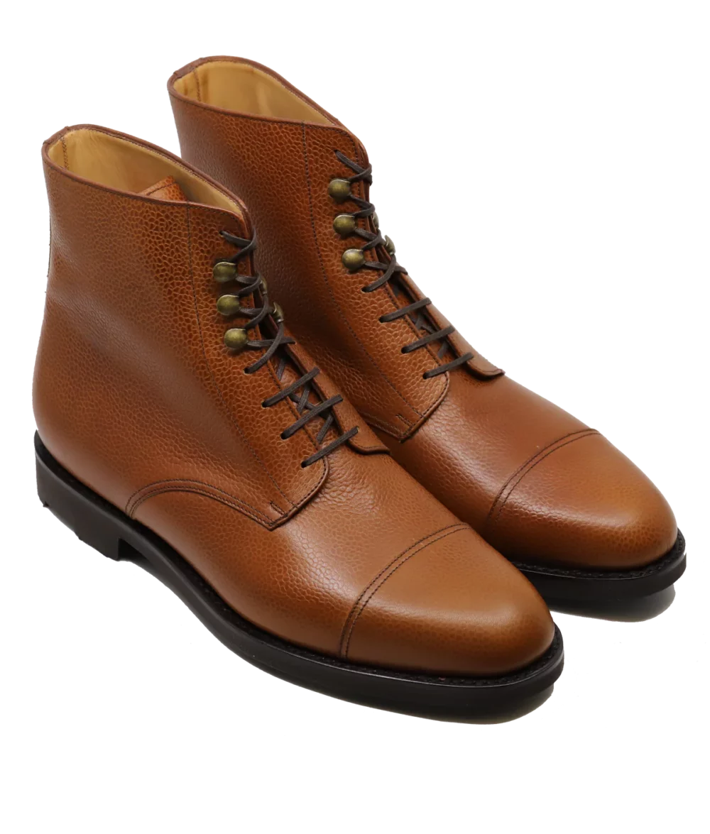Brown leather ankle boots with a textured finish, featured in the Septieme Largeur Summer Sale 2026.