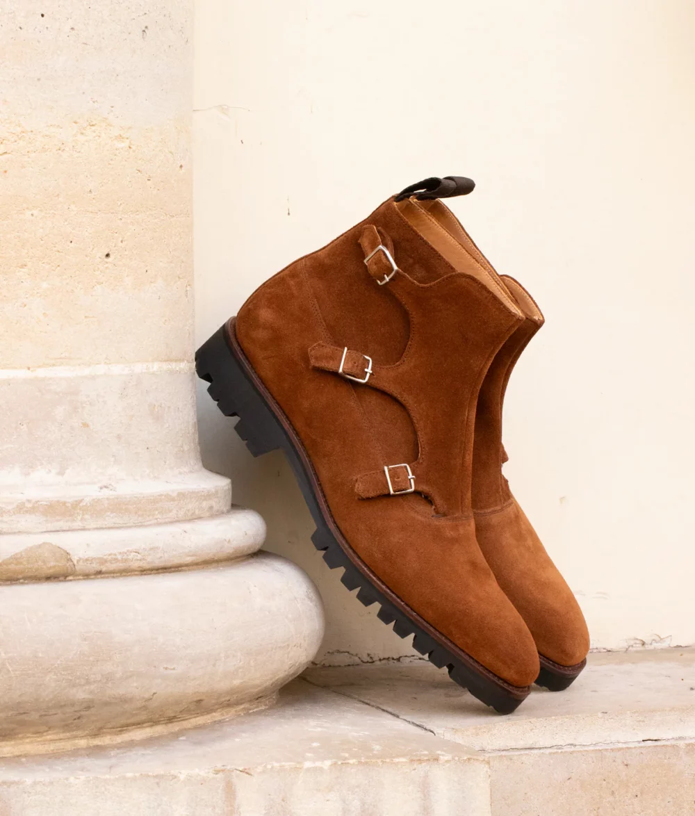 Brown suede ankle boots with silver buckles featured in the Septieme Largeur Summer Sale 2026.