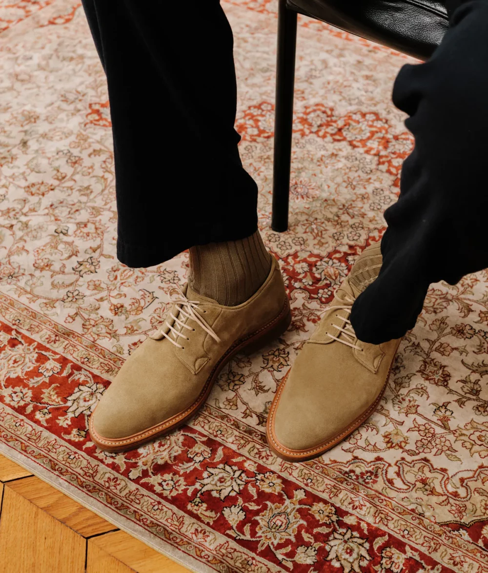 Beige suede shoes with light laces and brown soles featured in the Septieme Largeur Summer Sale 2026.