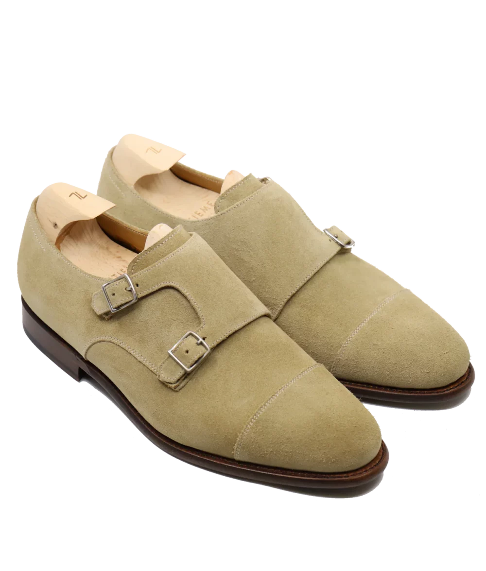 Light green suede double monk strap shoes featured in the Septieme Largeur Summer Sale 2026.