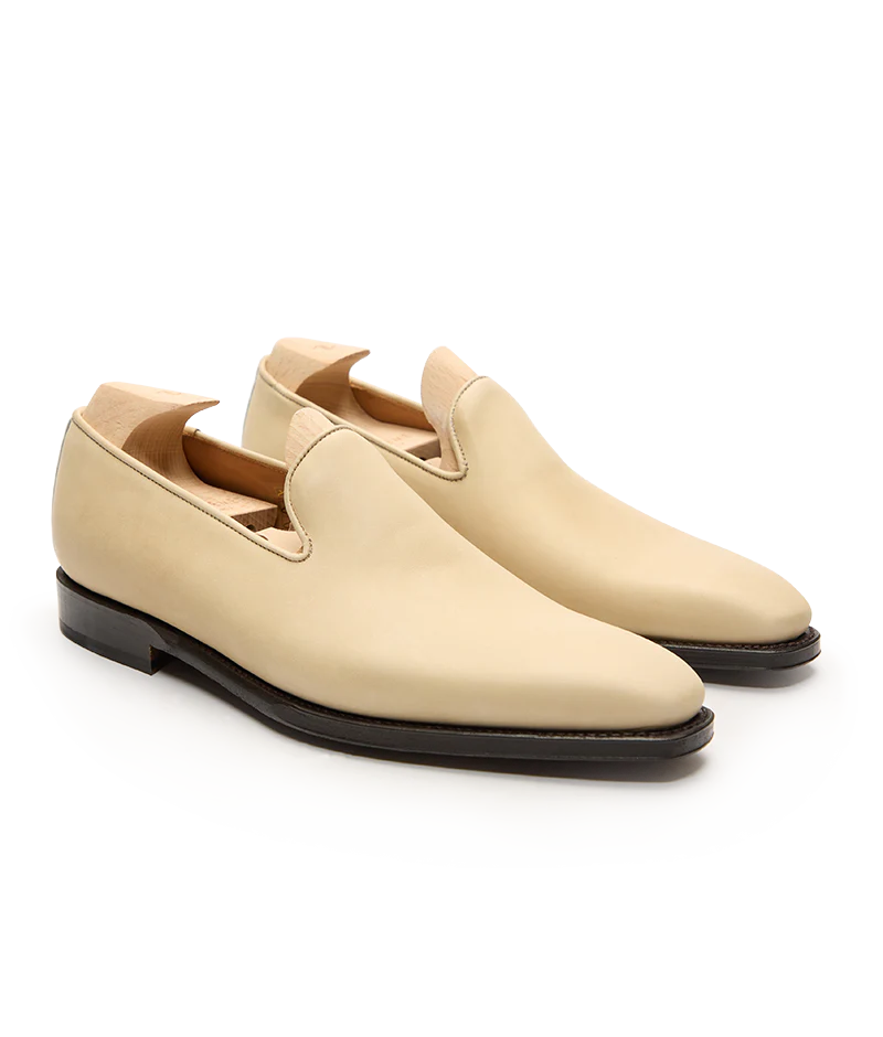 Beige leather slip-on shoes featured in the Septieme Largeur Summer Sale 2026.