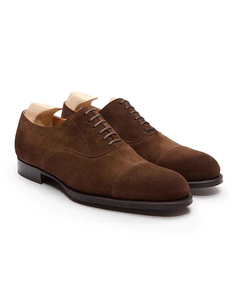 Brown suede shoes with a cap toe design featured in the Septieme Largeur Summer Sale 2026.