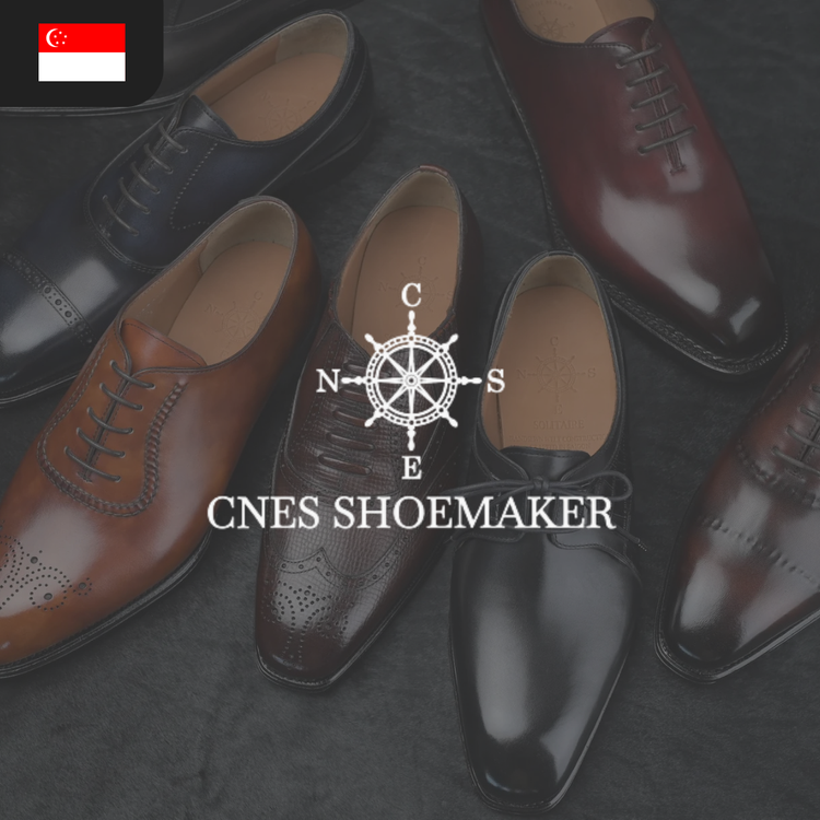 Various pairs of elegant leather shoes in shades of brown, black, and burgundy with decorative details.