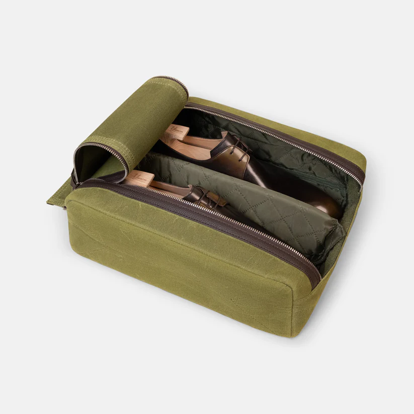 Arterton Signature Shoe Bag in olive green with a zippered compartment containing two pairs of shoes.