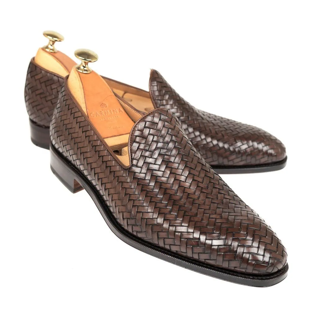 Brown woven leather loafers with a sleek design.