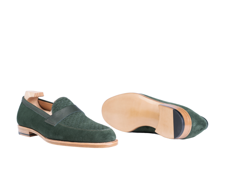Green suede Amalfi loafers with a leather strap and a light wooden sole.
