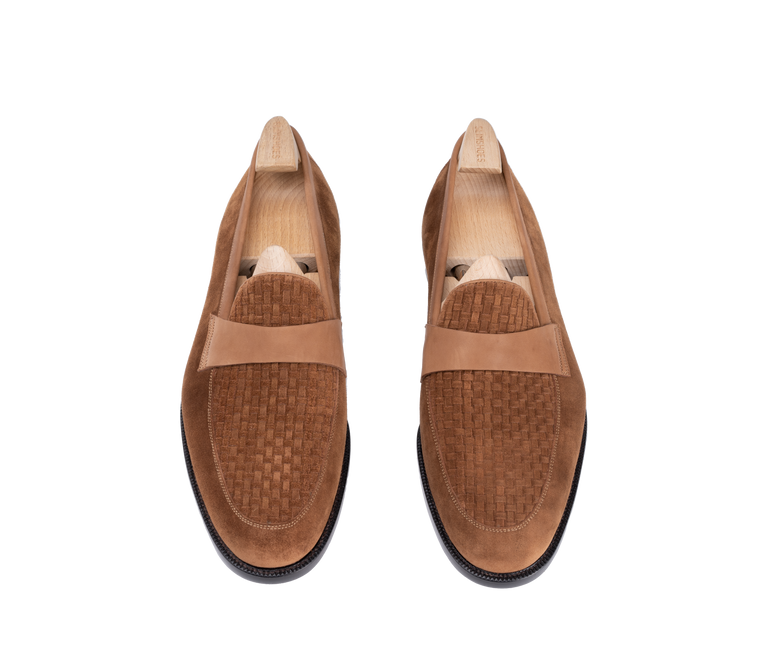 Brown suede Amalfi loafers with a woven texture and leather strap.