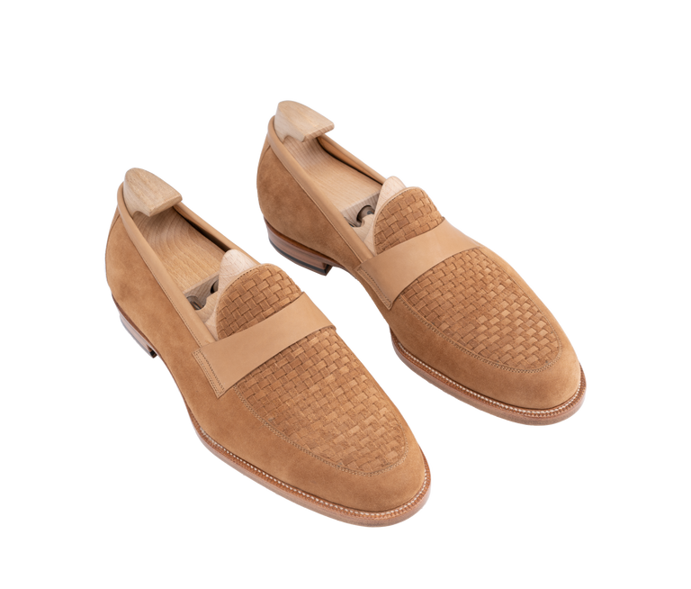 Tan suede Amalfi loafers with a woven texture on the toe and a smooth leather band across the instep.