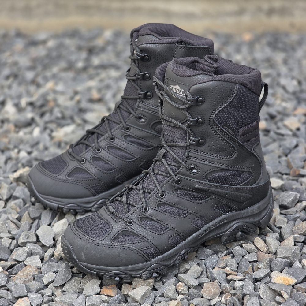 A pair of black hiking boots with textured surfaces, featured in "My New Chapter."