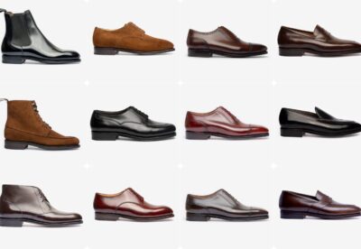 A collection of twelve pairs of shoes, including black leather boots, brown suede shoes, and polished dress shoes in various shades.